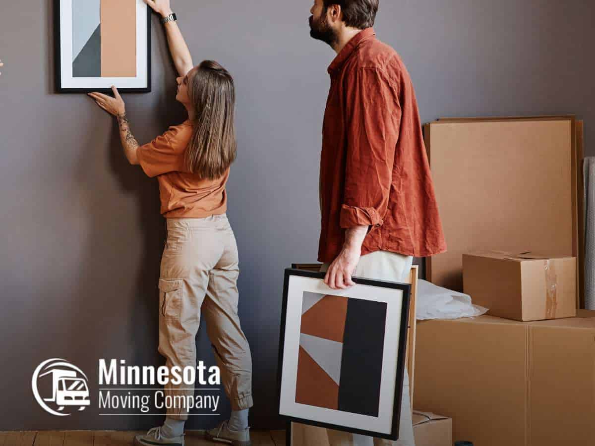 Carefully moving art to ensure safe transport during relocation