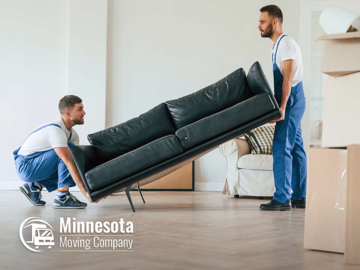 Professional movers carefully protect furniture from scratches during a long-distance move with expert handling and equipment